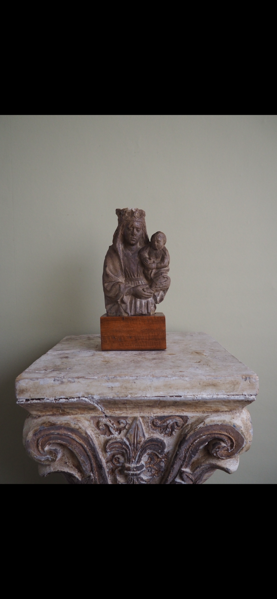 Early 15th century French limestone sculpture of the Virgin and Child, on pedestal