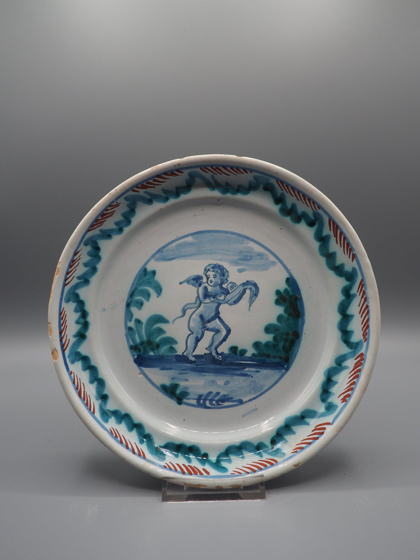 18th Century French Faience Dish with Putto