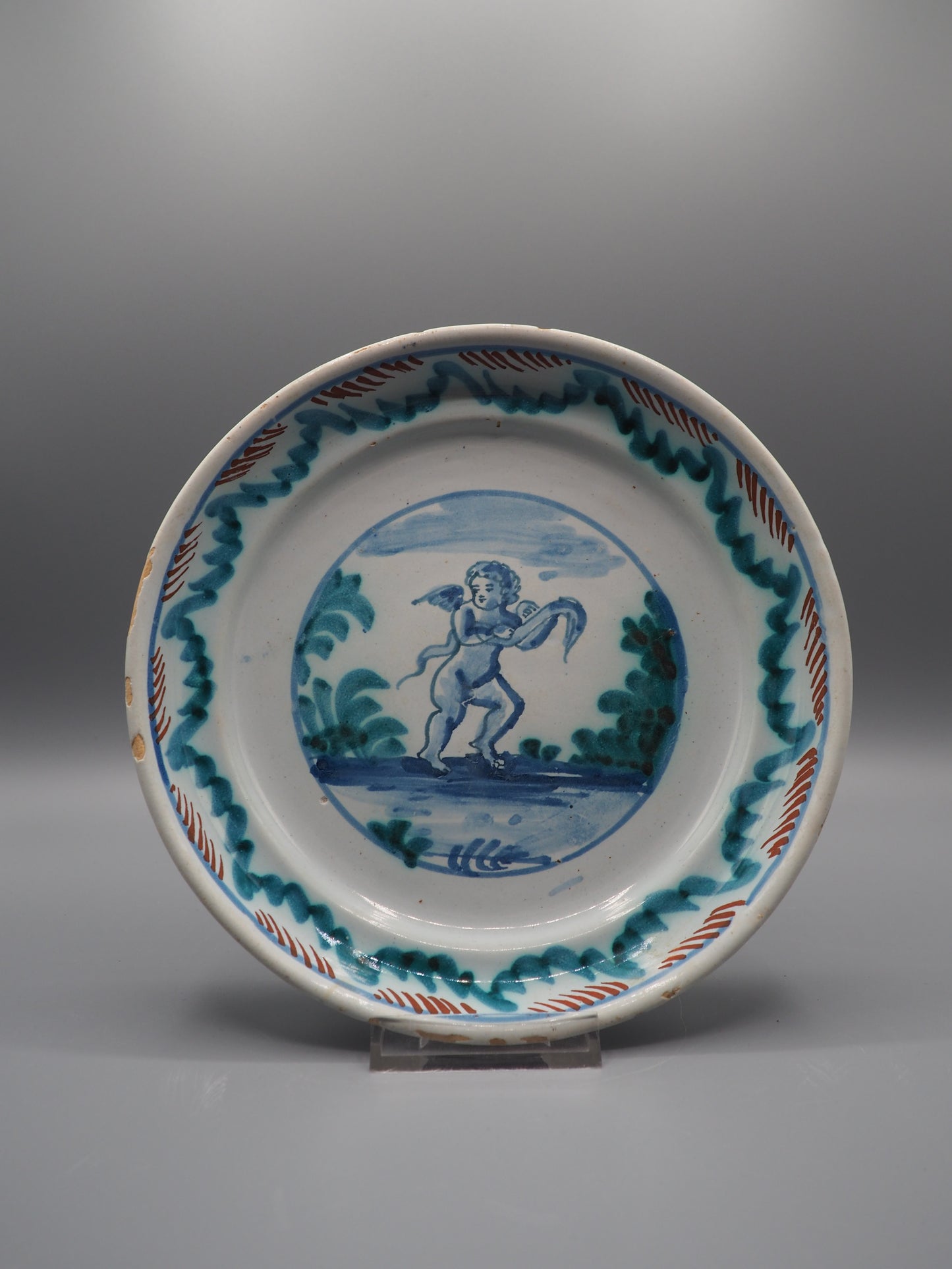 18th Century French Faience Dish with Putto