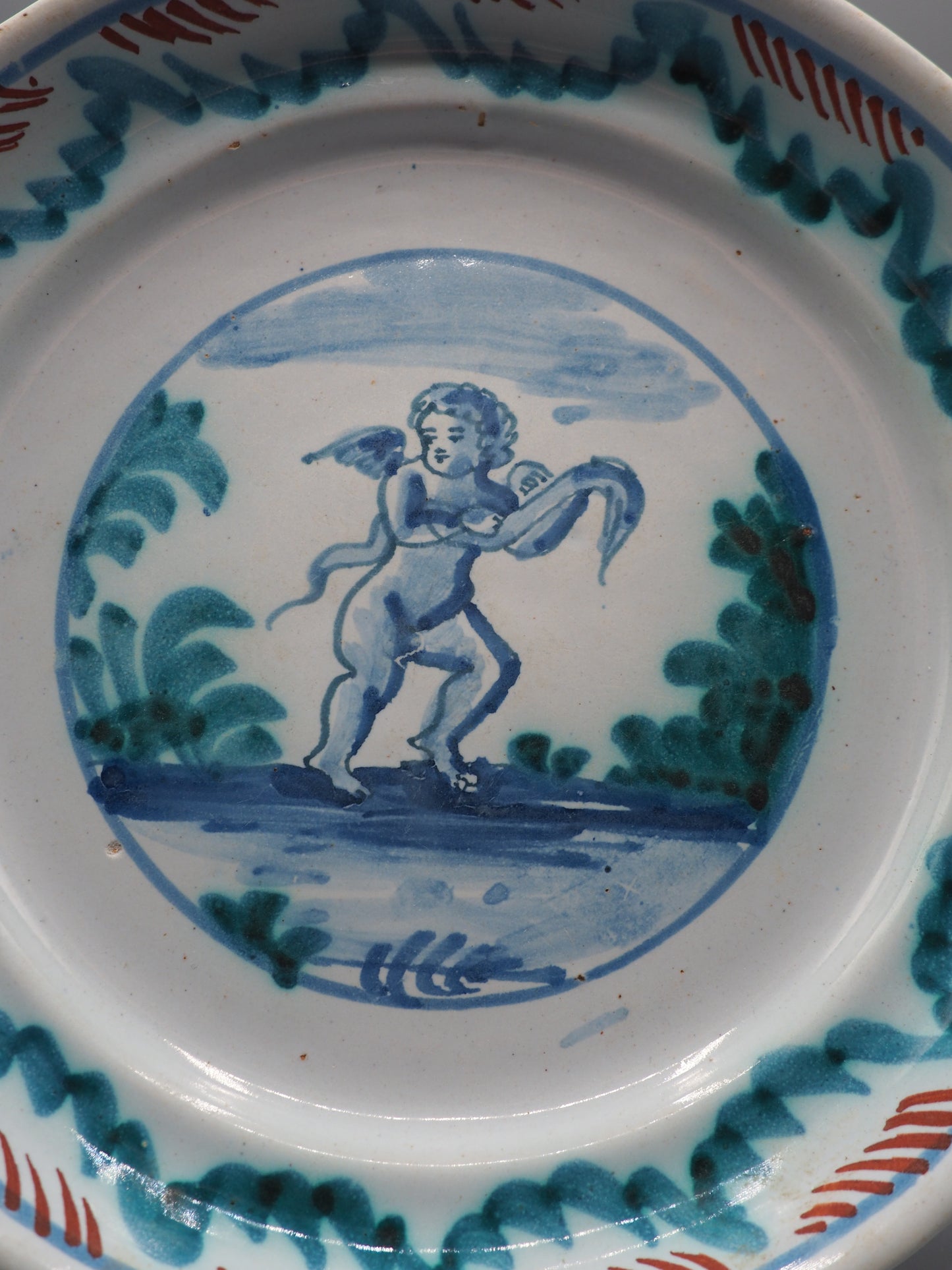 18th Century French Faience Dish with Putto
