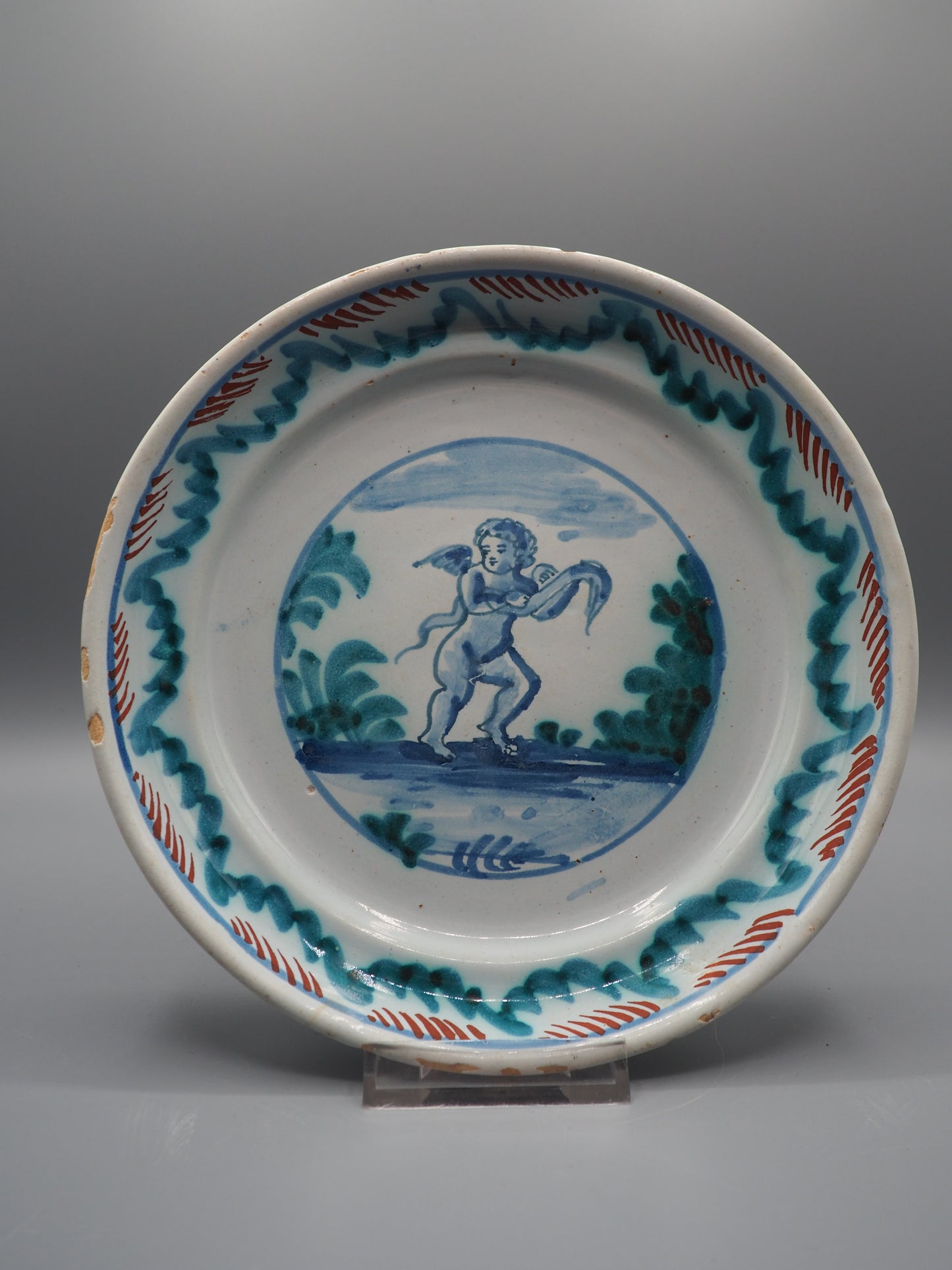 18th Century French Faience Dish with Putto