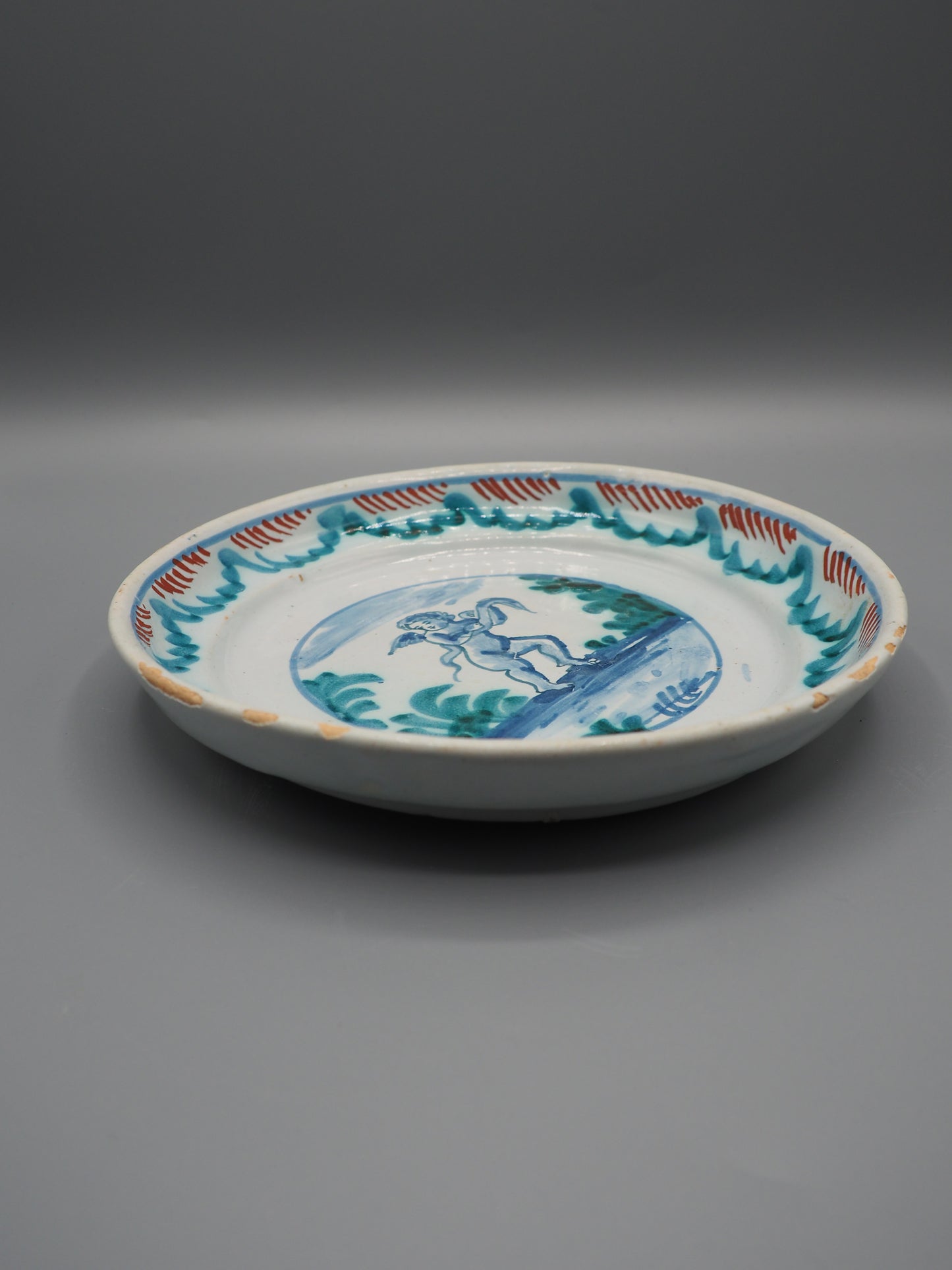 18th Century French Faience Dish with Putto
